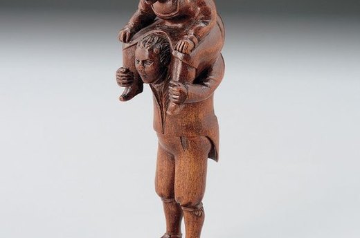 Man with Woman on Shoulders