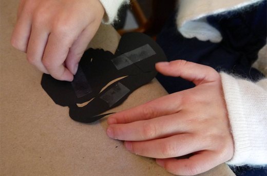 Tape the Black Silhouette to Card Stock