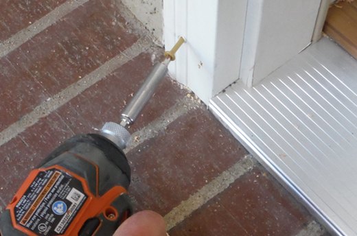 Set Screws through the Brick Mold