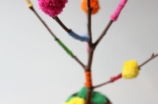 Glue Pom Poms to the Branch