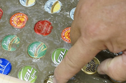 Finish Surface and Embed Bottle Caps