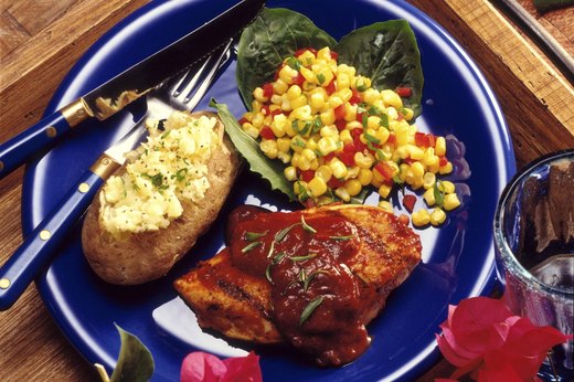 Barbecue Chicken with Baked Potato and Corn