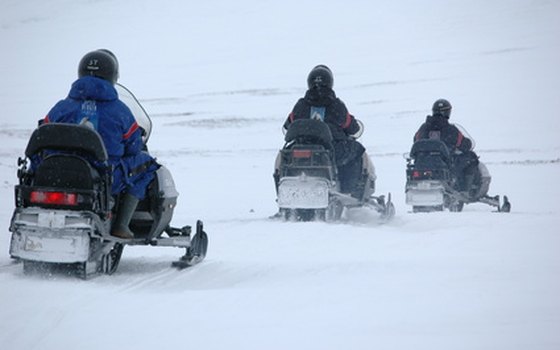 Wintertime activities in Idaho include snowmobiling.