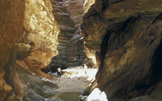 The entrance to Petra is through a remarkable path between facing cliffs.