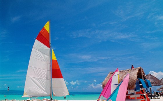 Visitors can opt for action or simply sunbathing on Cancun's beaches
