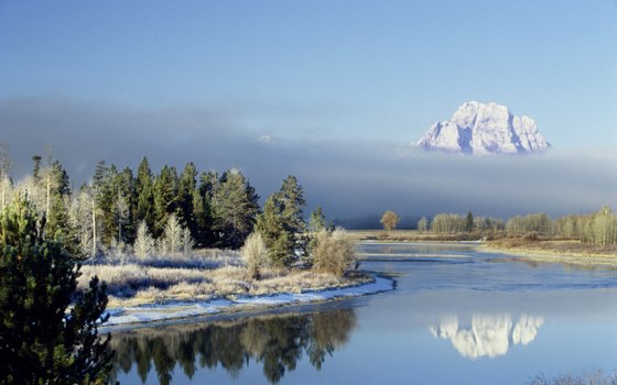 Families and leisurely walkers enjoy the miles of trails that circle the lakes below the Tetons.