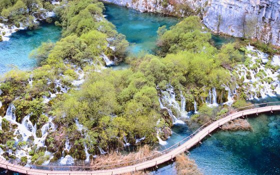 Plitvice Lakes in Croatia is reached by motor coach.