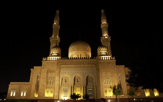 Jumeirah Mosque lights up the night sky in Dubai.