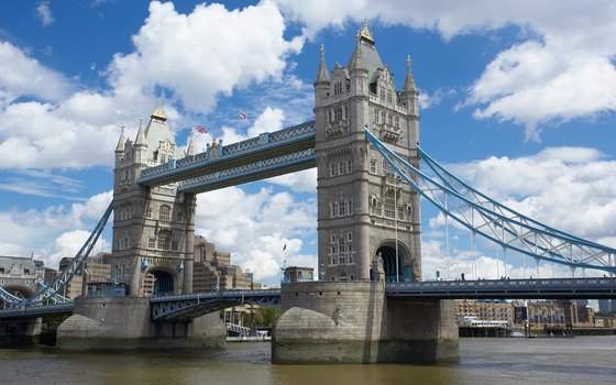 Tower Bridge spans the Thames River in front of the Tower of London.