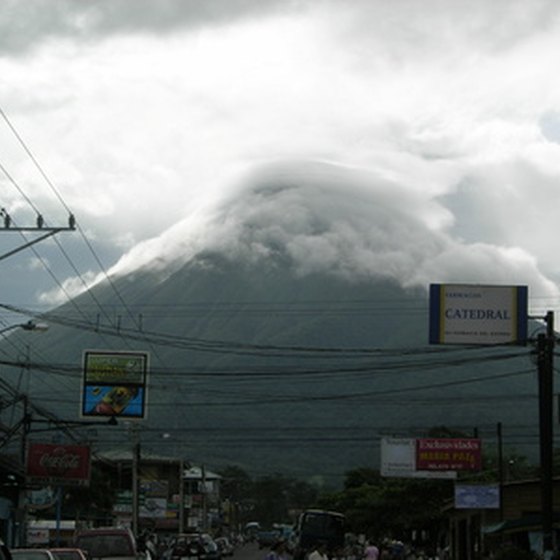 Arenal Volcano dominates the skyline above La Fortuna, Costa Rica