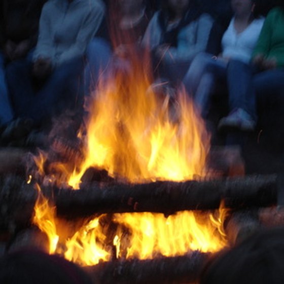 A campfire is just one of the benefits of staying in a RV park.