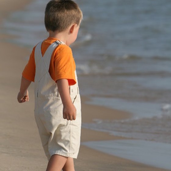 Playing on the shores of Lake Michigan provides a calm vacation experience for many families.