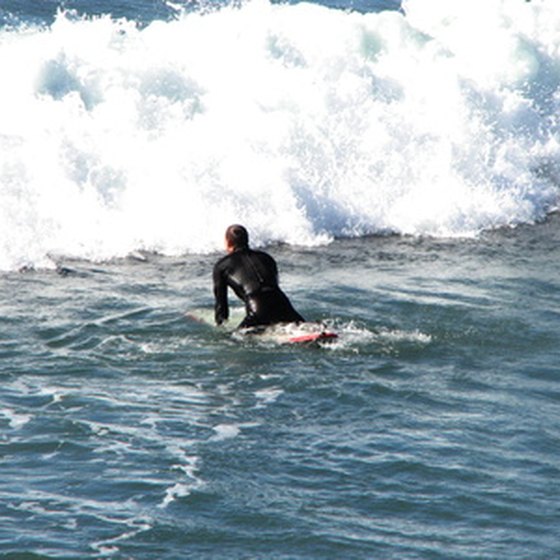 Beginners surf the calm waters at Mission and La Jolla, while experienced surfers head to Swami's.
