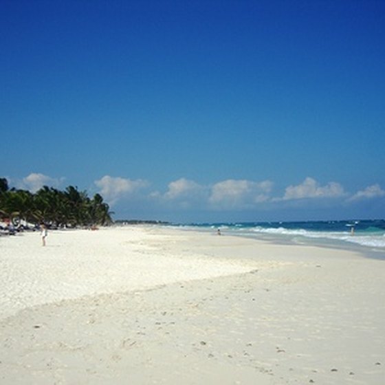 The white sand beaches of Cancun draw international vacationers.