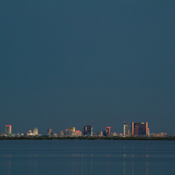 The casinos of Atlantic City light up the evening sky.