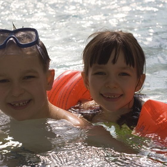 All-inclusive camps help kids learn new skills like swimming.