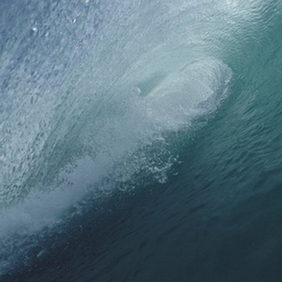 Surfing in Bali means huge waves, but dangerous reefs.