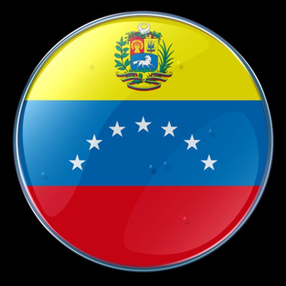 The Venezualan flag and coat of arms on a button.