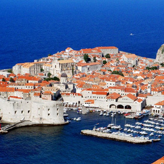Tile rooftops and bright blue waters welcome visitors to Dubrovnik.