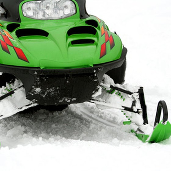 Enjoy Utah's light powder on a snowmobile.