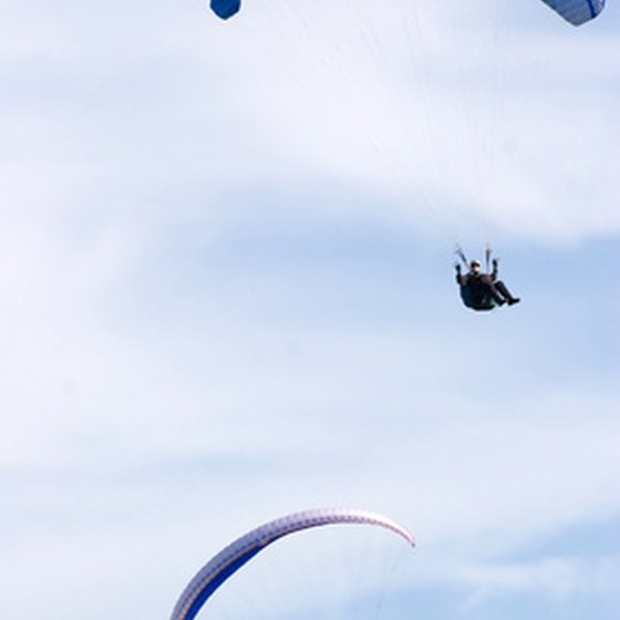 A couples vacation that includes adventurous activities like parasailing can be a great way to tighten your bond.