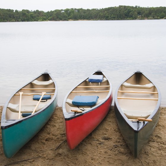 Canoeing is done on calm waters, usually lakes.