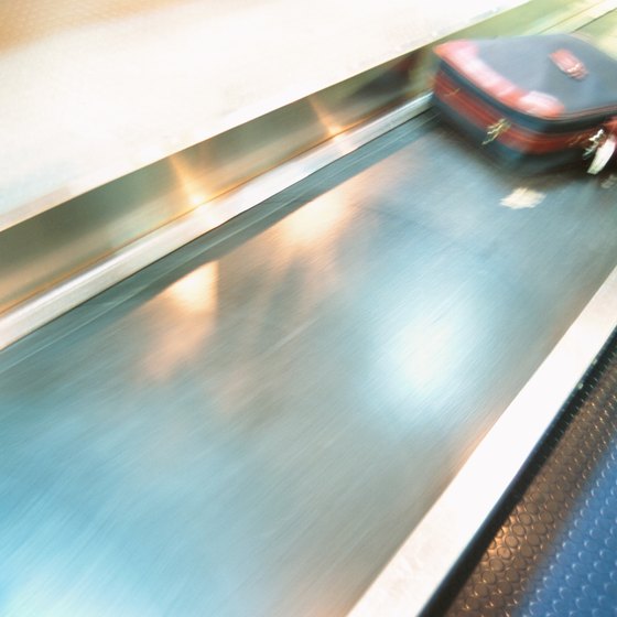 A unique suitcase is easy to spot on the baggage carousel.
