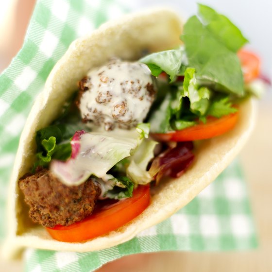 Falafel are fried spiced balls of chickpeas, often wrapped in pita bread.