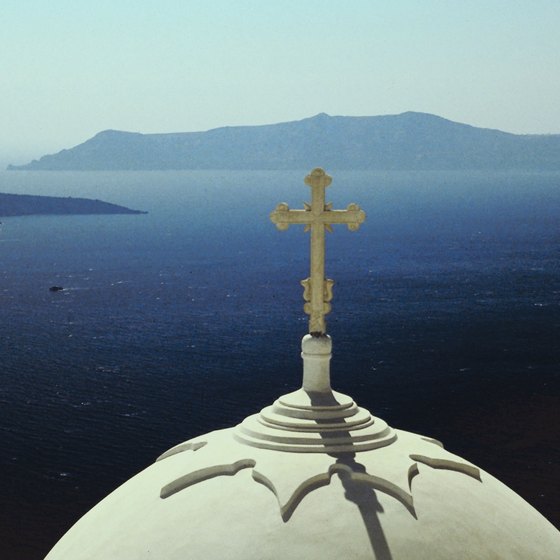 Santorini's capital, Fira, renowned for its Cycladic architecture, overlooks the Aegean Sea.