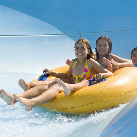 Take a wild ride with the whole family on a tube slide at a Florida water park by the beach.