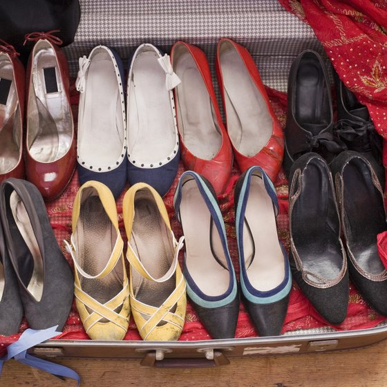 Fit small items like phone chargers and bags of jewelry in your shoes to conserve space.