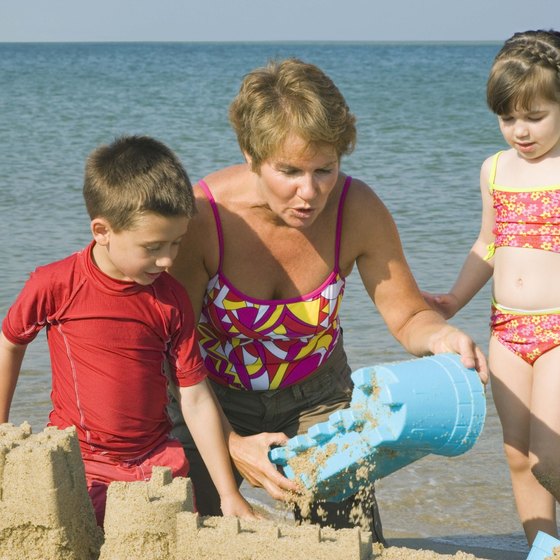 Children enjoy building sand castles.
