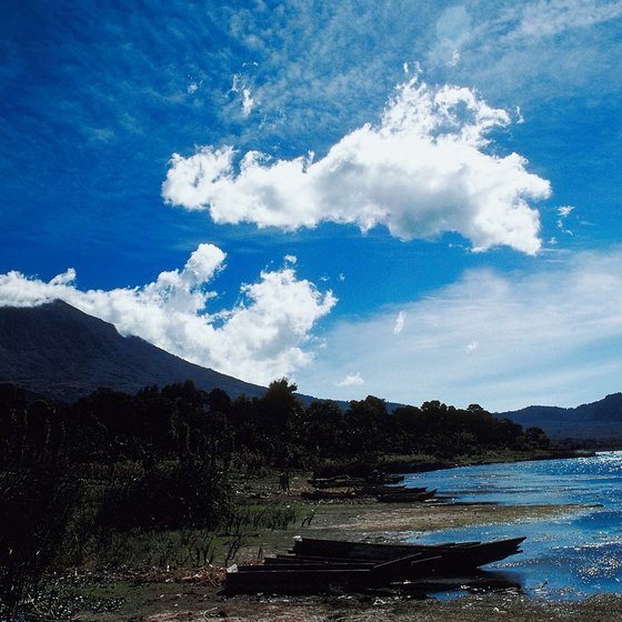 Beaches at Lake Atitlan have views of deep blue water and green volcanoes.