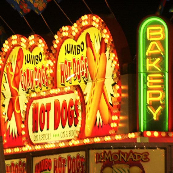 Carnivals typically include a midway with amusement rides and food booths.