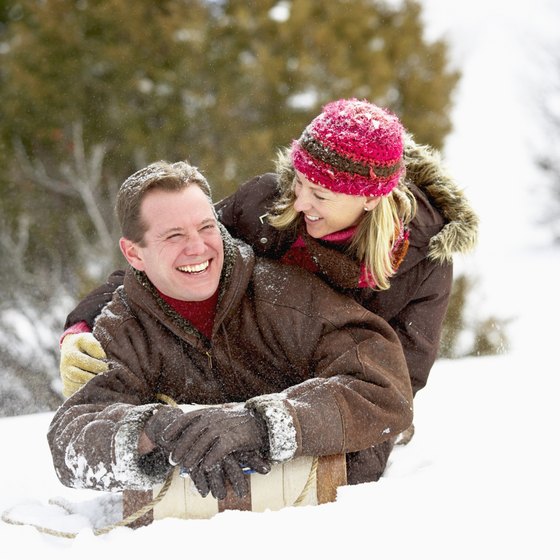Tobogganing is a cheap and romantic date idea.