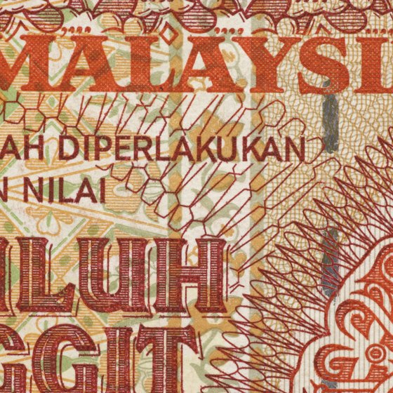 Colorful Malaysian bills feature a picture of the first prime minister, Tunku Abdul Rahman.