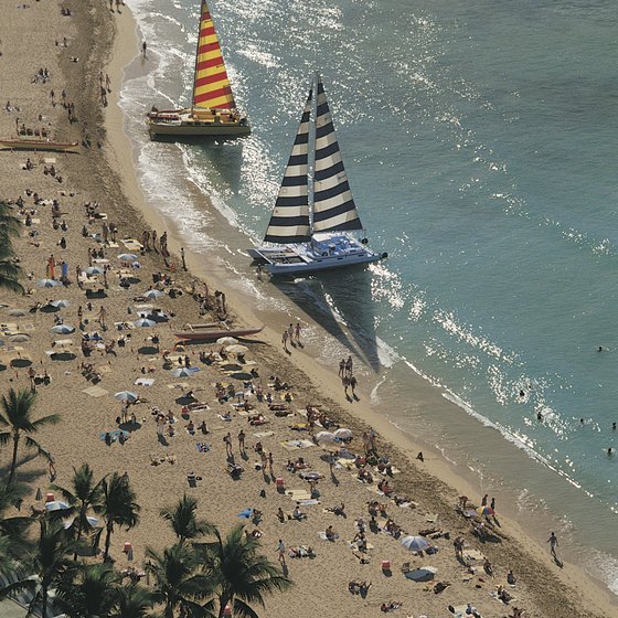 Waikiki Beach in Hawaii offers year-round sunshine and warmth.