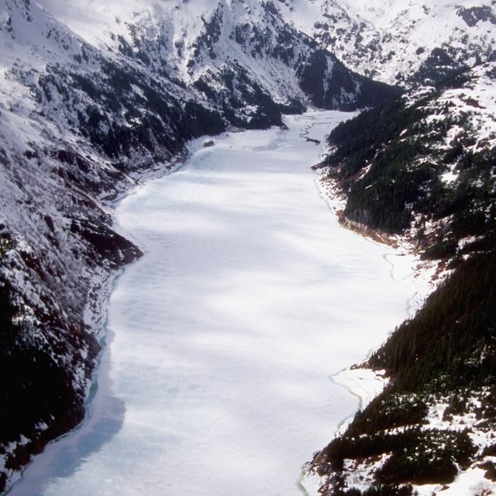 Cruises to Alaska pass snow-capped mountains and fjords.