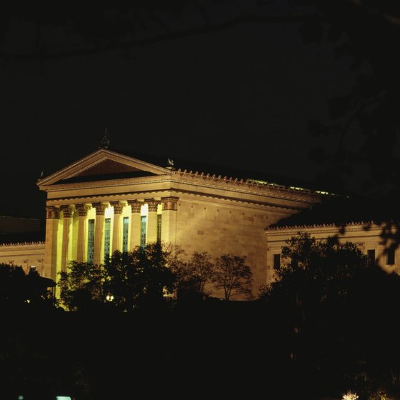 The Philadelphia Museum of Art, shown illuminated, is near the Schuylkill River.