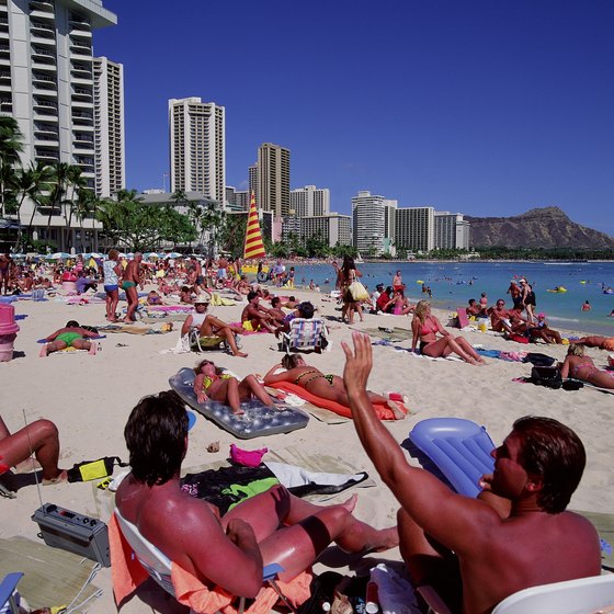 Beachfront hotels in Oahu draw visitors from around the world.