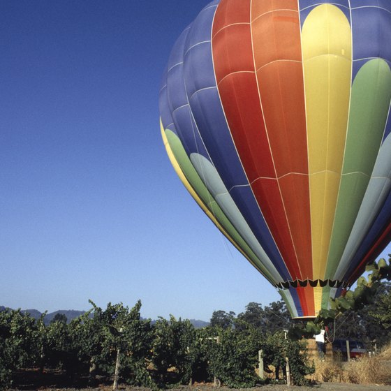 Hot air balloon near vineyards in Napa Valley.