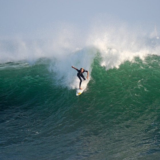 Ride a huge wave at "The Wedge," in Newport Beach.