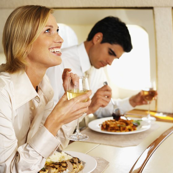 Wine is typically free on Transatlantic flights, but it will dehydrate you and worsen your jet-lag.