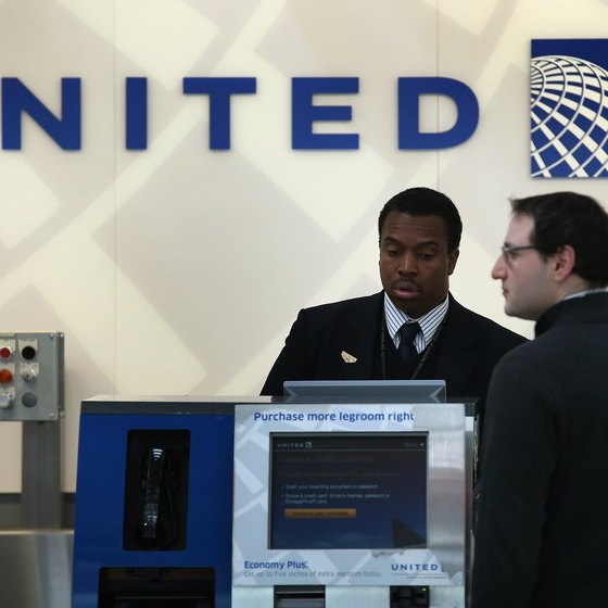 United Airlines allows business class and premium passengers extra checked baggage.