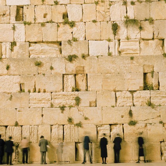 Praying at the Wailing Wall in Jerusalem.