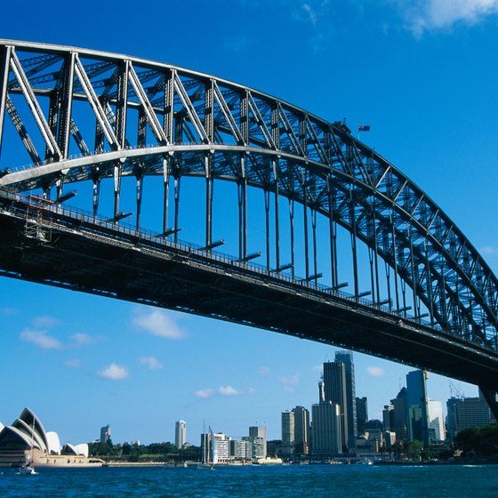 Sydney's double decker sightseeing buses stop at famous attractions, such as Harbour Bridge.