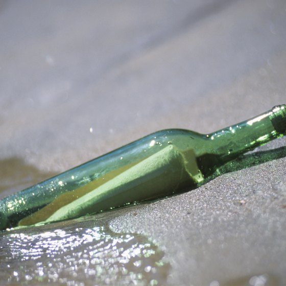 Discarded bottles break down to become soft and polished beach glass.