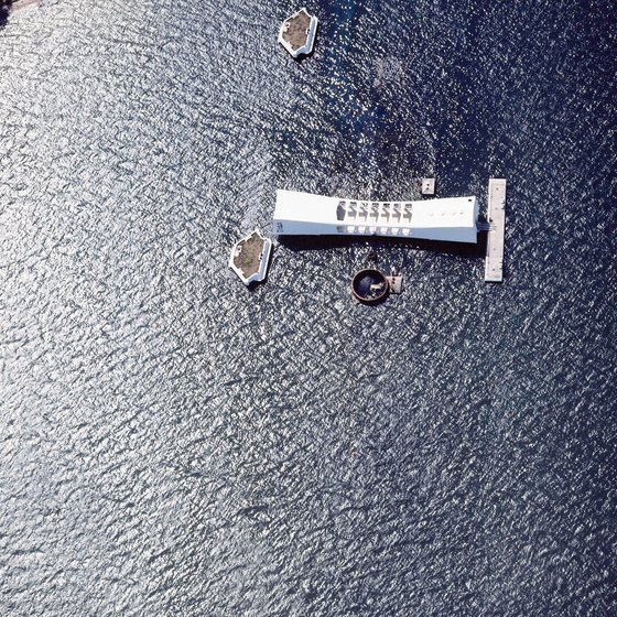 The simple white memorial is built over the remnants of the USS Arizona, which was bombed by Japanese airstrikes in 1941.