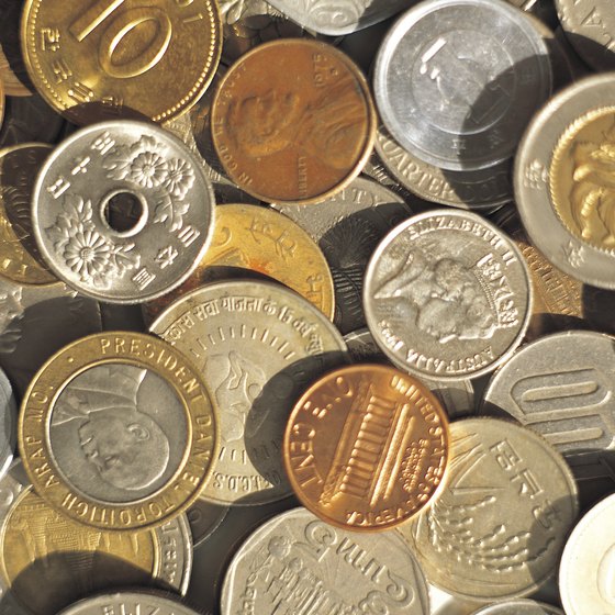 You can cash in foreign coins but should expect a return of a fraction of the face value.