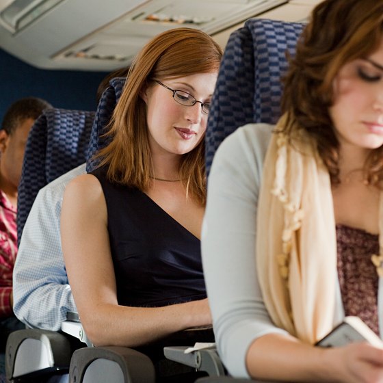 Cramped airline seats contribute to leg soreness on long flights.